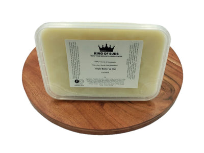 Melt & pour soap in a container with a label on a wooden board